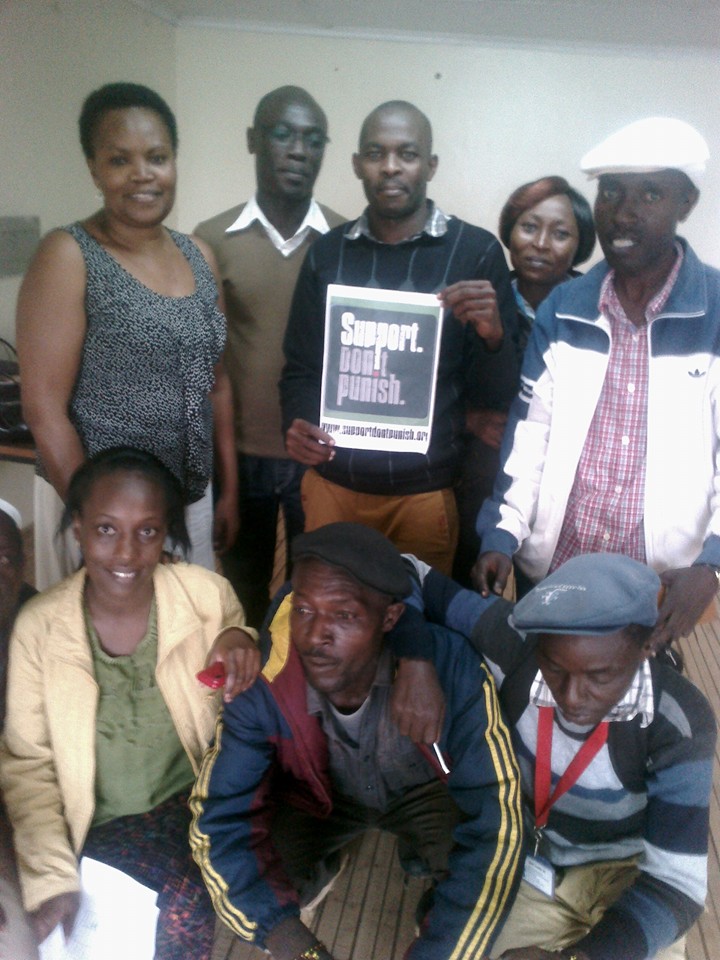 KeNPUD members holding Support Don't Punish signs