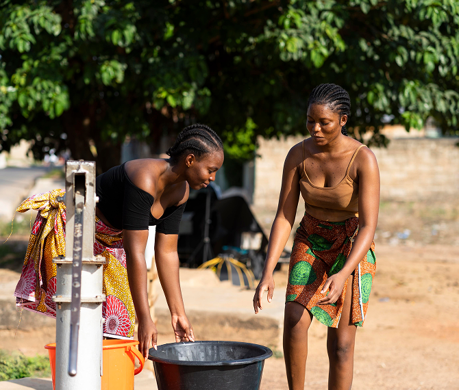 Beautiful African Women Fetching Water 1